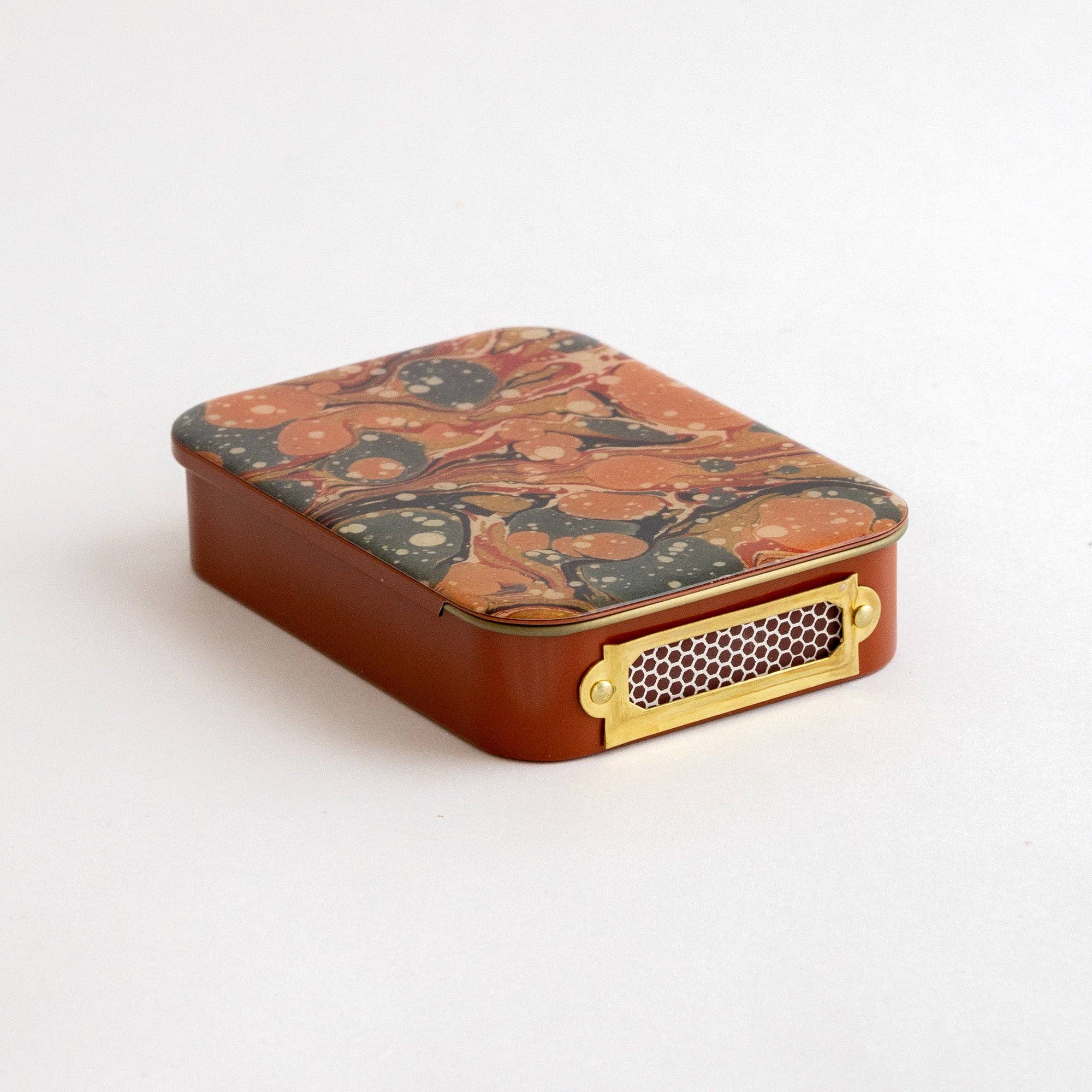 The Art of Marbling Matches in Tin