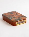 The Art of Marbling Matches in Tin