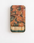 The Art of Marbling Matches in Tin